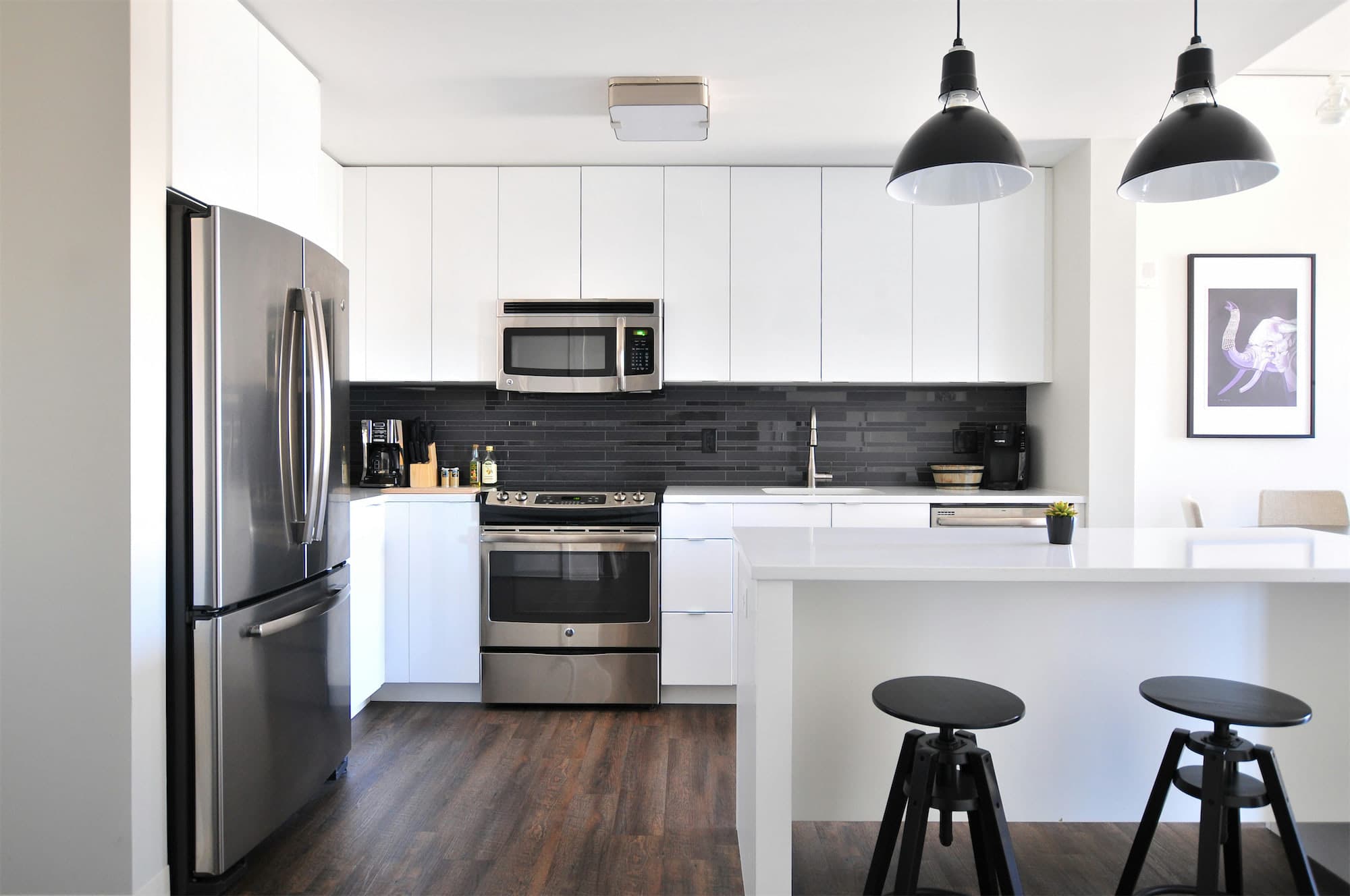 A bright, uncluttered modern kitchen after a thorough clean
